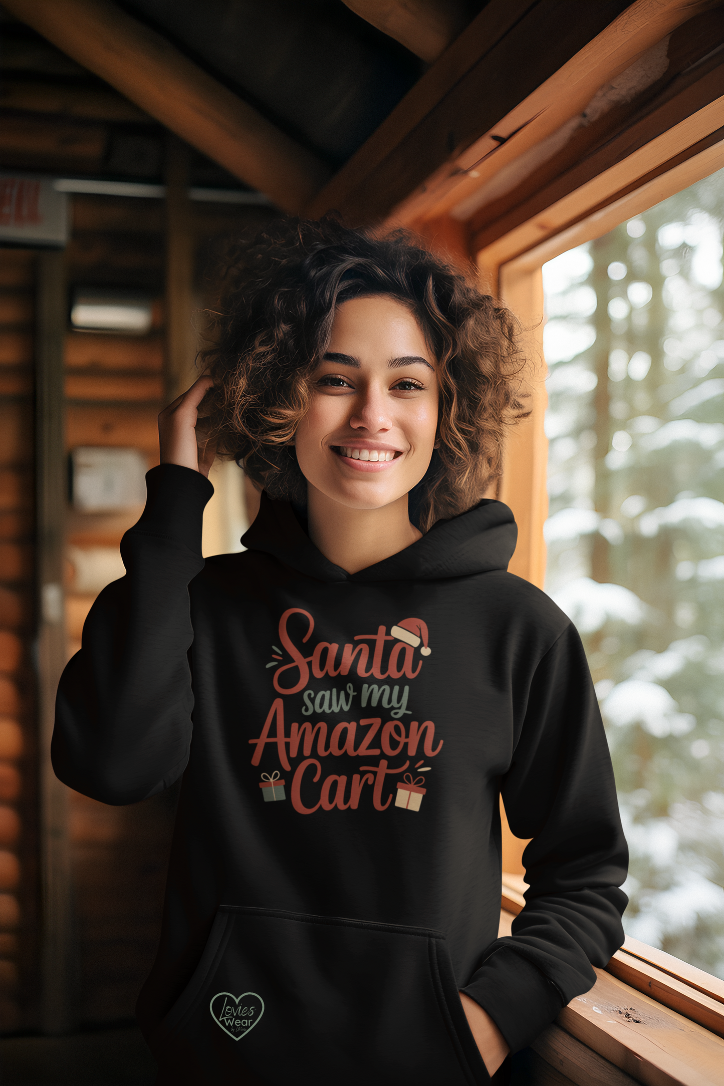 Black hoodie with Santa Saw My Amazon Cart text, cozy humorous Christmas apparel for December designed by Lovies Wear