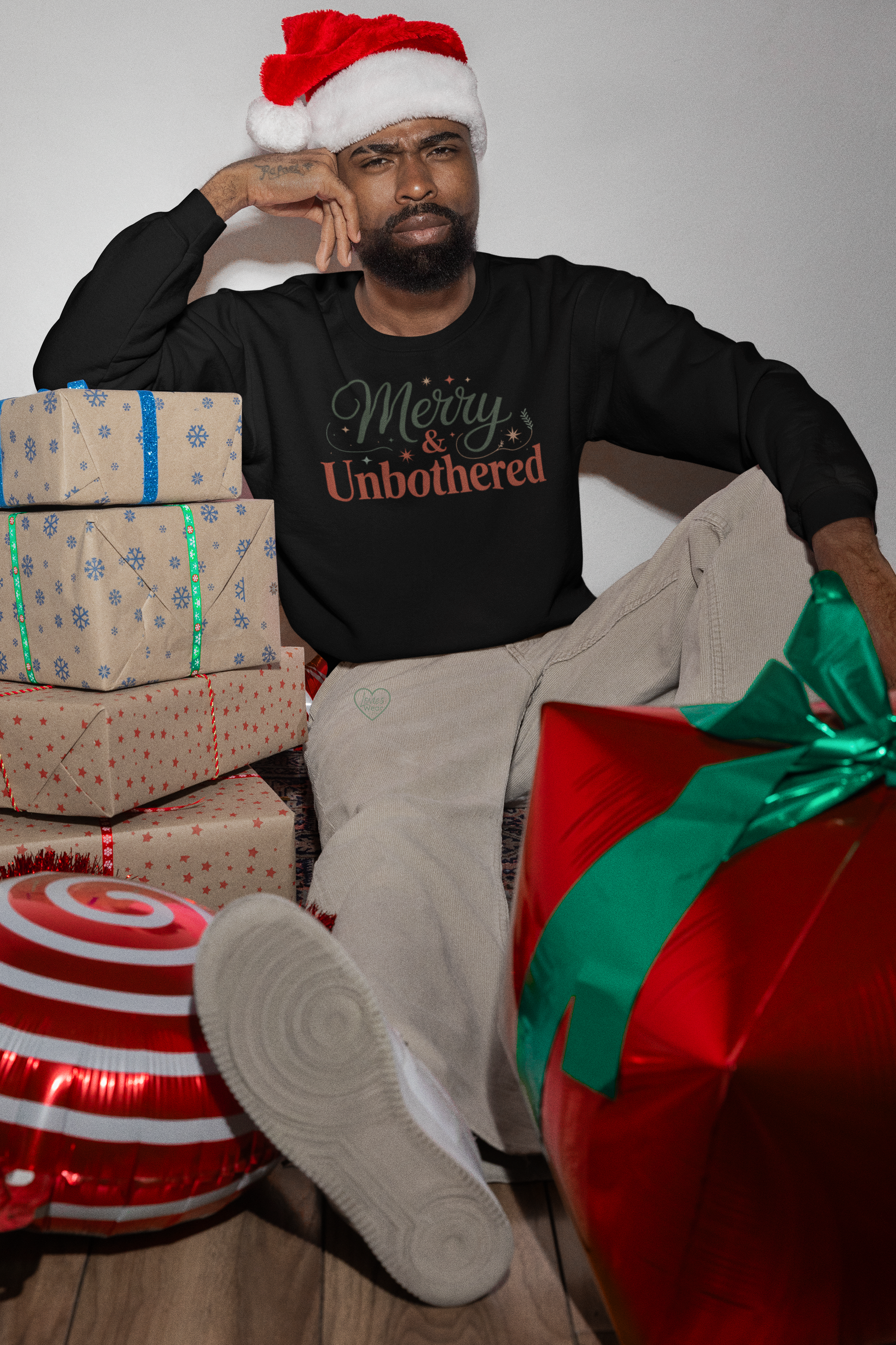 Merry and Unbothered Christmas sweatshirt in black, festive minimalist holiday design by Lovies Wear