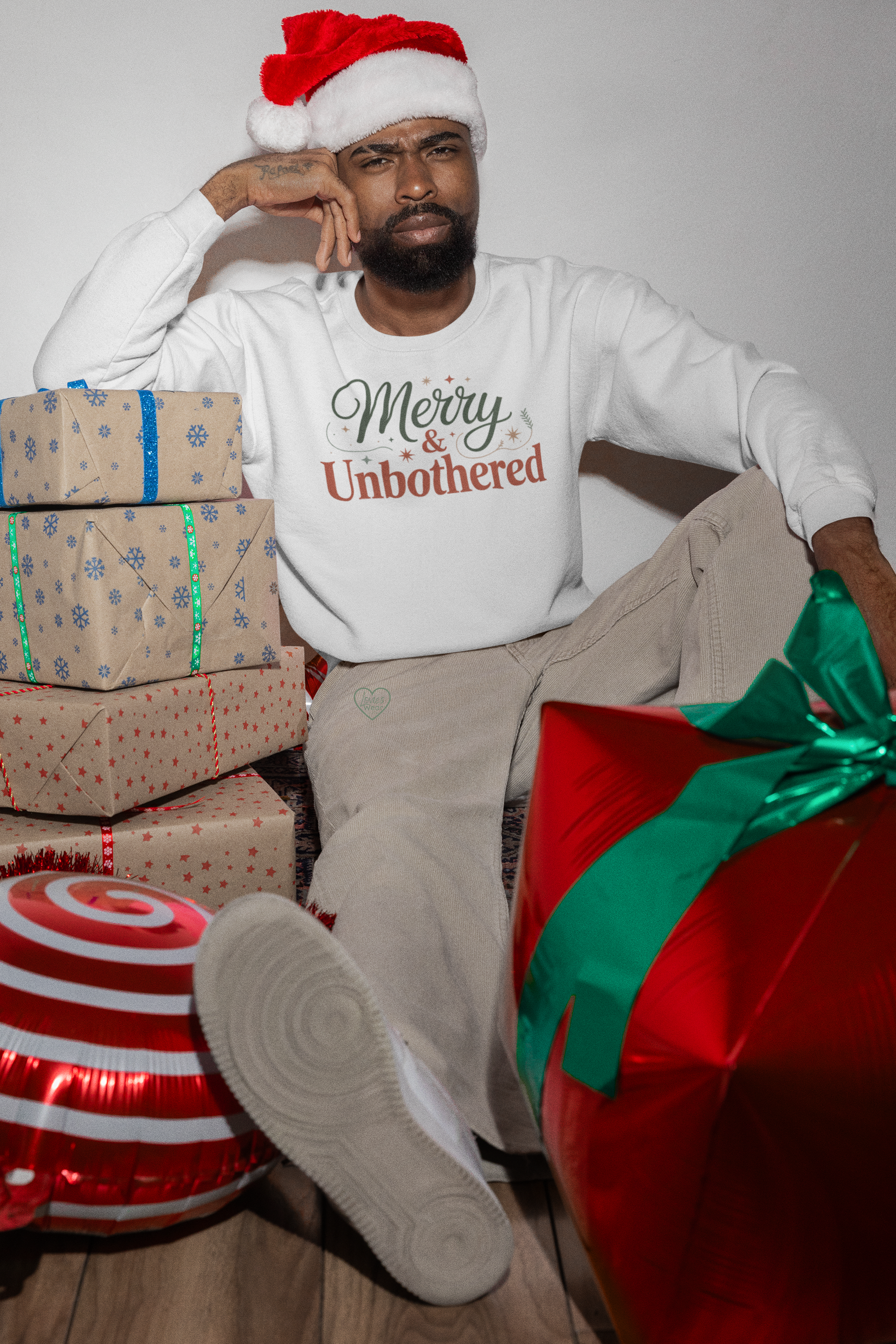 Merry and Unbothered Christmas sweatshirt in white, festive minimalist holiday design by Lovies Wear
