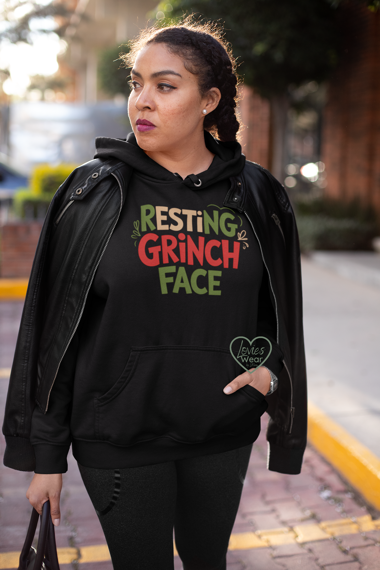 Resting Grinch Face Christmas hoodie in black, funny sarcastic holiday design by Lovies Wear