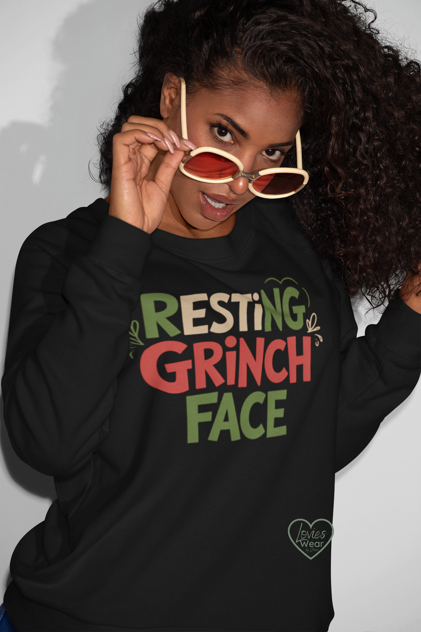 Resting Grinch Face Christmas sweatshirt in black, funny sarcastic holiday design by Lovies Wear