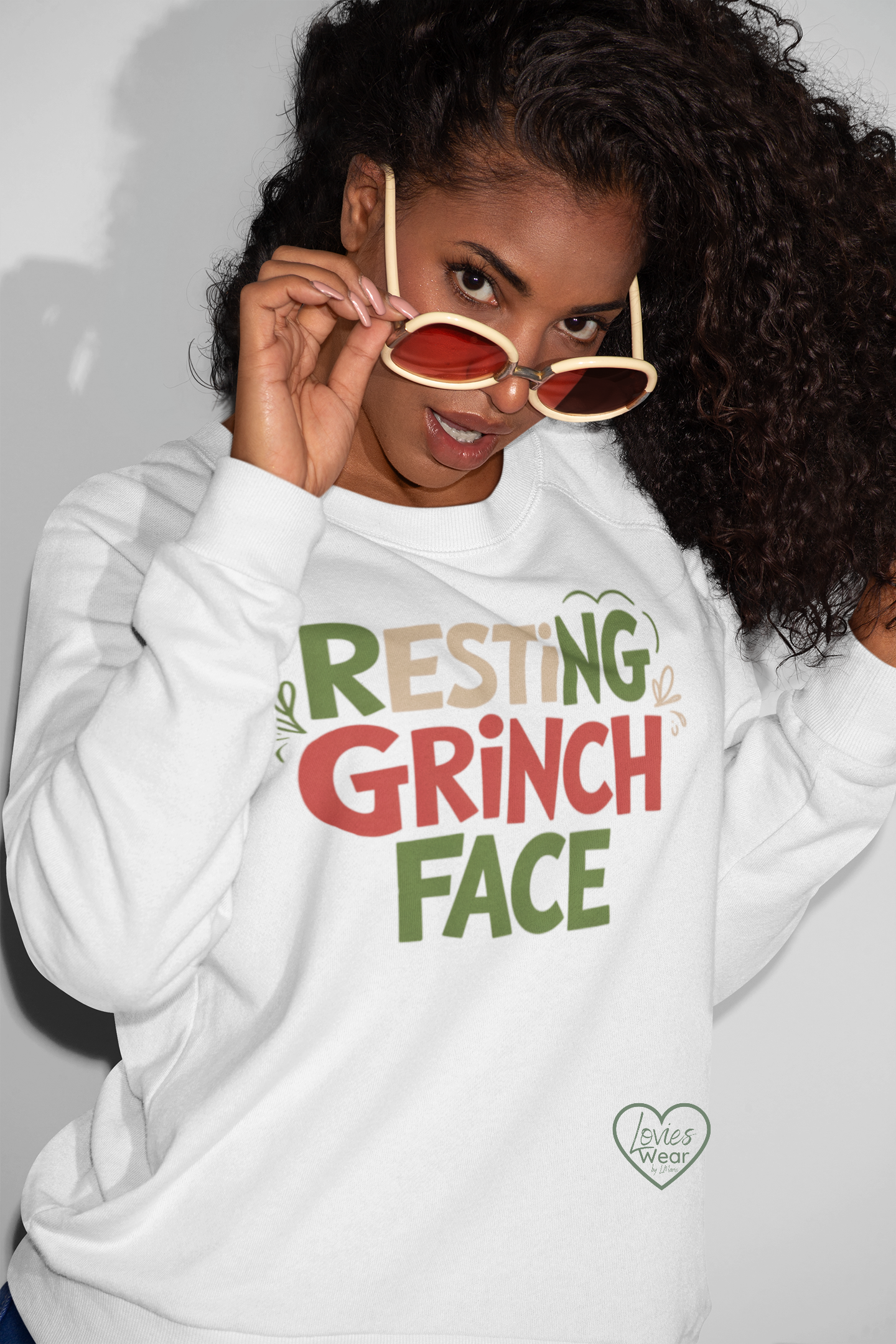 Resting Grinch Face Christmas sweatshirt in white, funny sarcastic holiday design by Lovies Wear